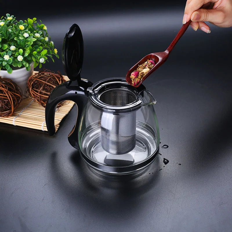 Théière en verre transparente et infuseur inox amovible vue de face