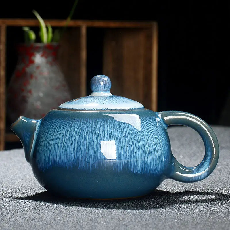 Théière en céramique émaillée bleu dégradé vue de face