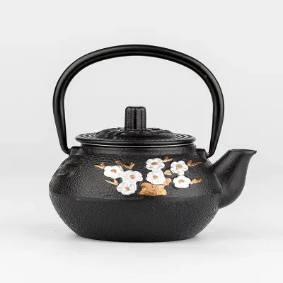 Théière japonaise en fonte fleurie vue de dessus