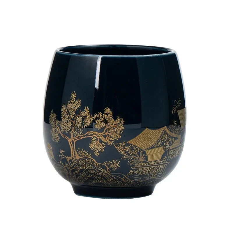 Tasse à thé en céramique noire, décor doré de pavillon et d'arbres