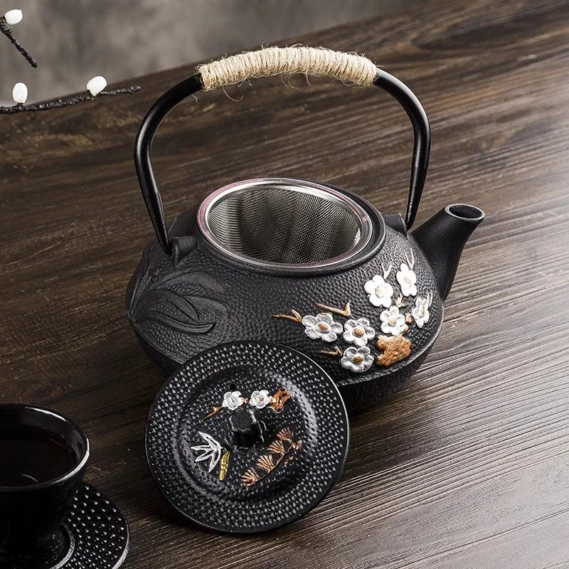 Théière japonaise en fonte fleurie avec infuseur inox