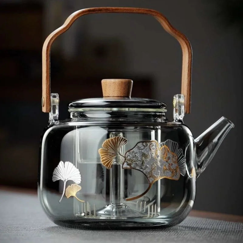 Théière en verre borosilicate avec anse en bois et décor