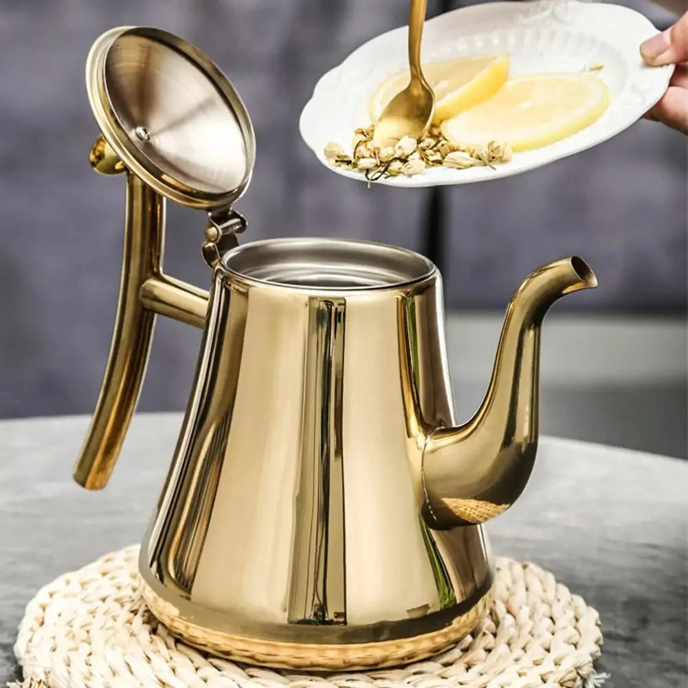 Théière inox dorée vue de profil élégante