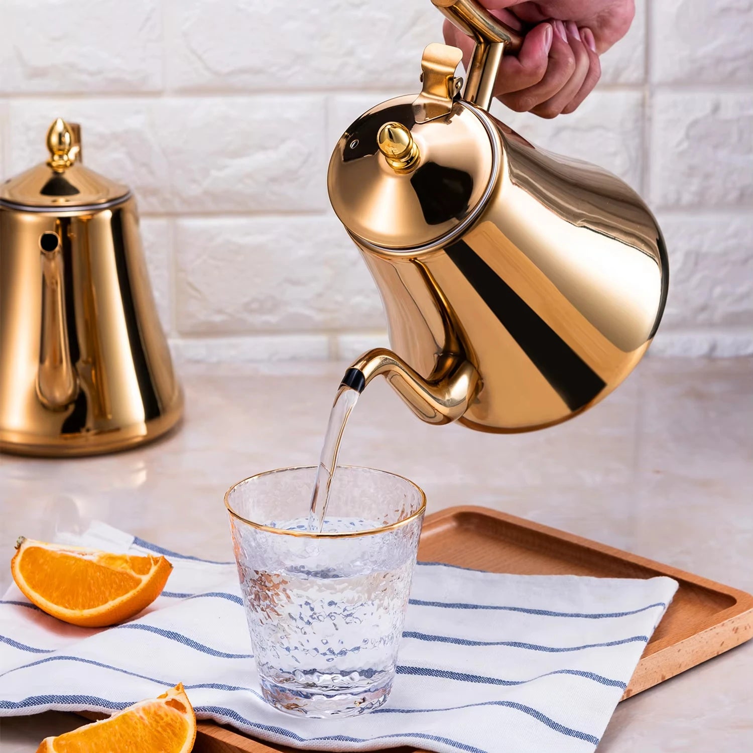 Poignée ergonomique théière inox design contemporain