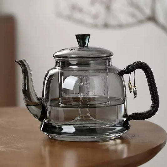Théière en verre fumé avec poignée tressée et infuseur