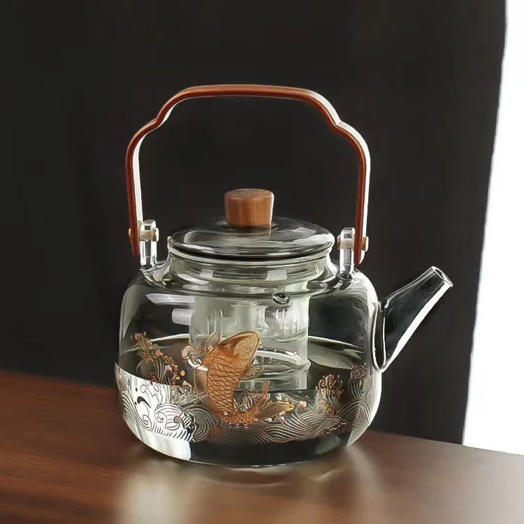 Théière en verre avec anse bois vue de côté
