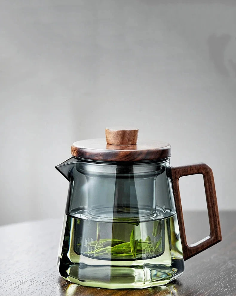 Vue de dessus théière verre et couvercle en bois