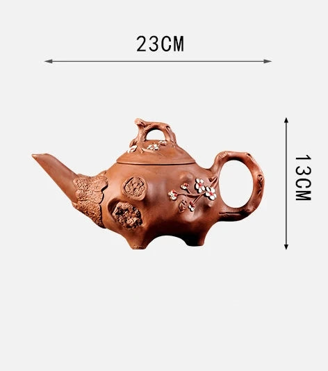 Gros plan texture argile naturelle sculptée théière design organique