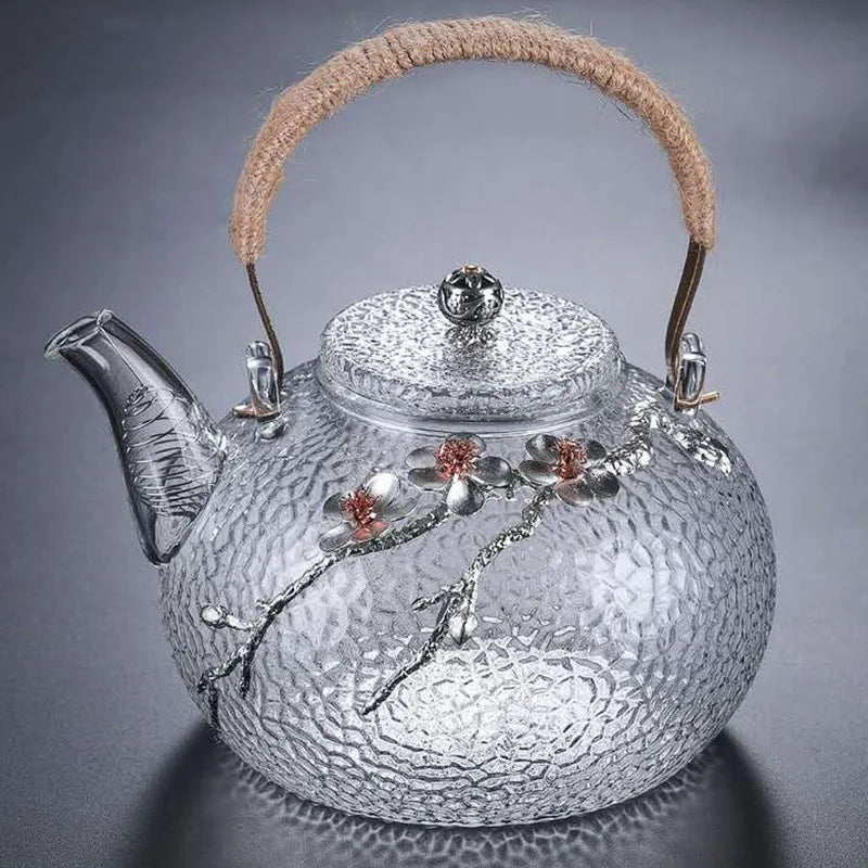 Théière en verre borosilicate texturé avec décor floral et poignée corde