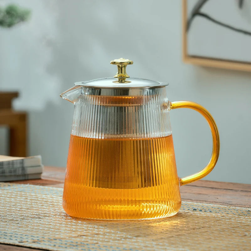 Théière en verre nervuré vue du dessus couvercle métal