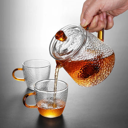 Théière en verre martelé avec poignée ambrée vue de face