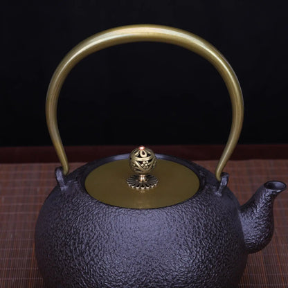 Anse métallique dorée théière japonaise en fonte