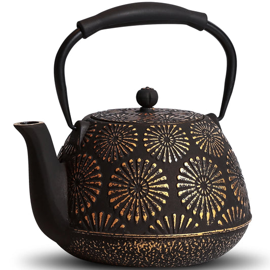 Théière japonaise en fonte motifs dorés rayonnants vue de face